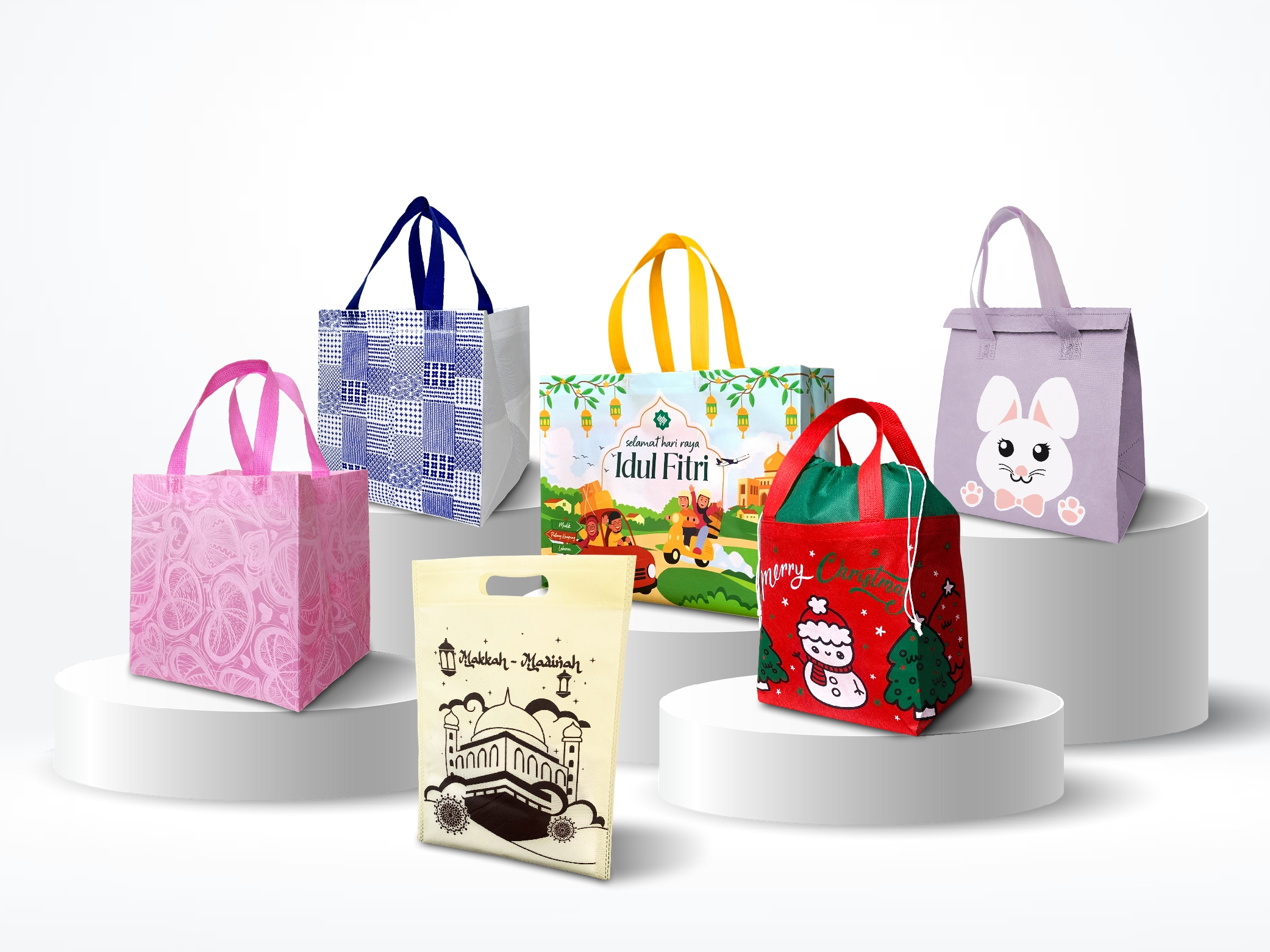 Koleksi tas spunbond Ready to Use dengan berbagai motif untuk perayaan, ibadah, hadiah, dan kebutuhan sehari-hari
